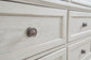 Robbinsdale Queen Sleigh Bed with Storage with Mirrored Dresser