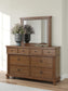 Rowlenstown King Poster Bed with Mirrored Dresser