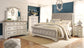 Realyn King Sleigh Bed with Mirrored Dresser, Chest and Nightstand