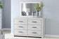 Cayboni King Panel Bed with Mirrored Dresser and Nightstand