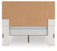 Zuraleus Queen Upholstered Panel Bed, Dresser, Mirror and Nightstand