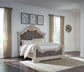 Bruchandi King Upholstered Panel Bed with Mirrored Dresser
