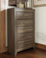 Juararo King Panel Bed with Mirrored Dresser, Chest and Nightstand