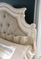 Realyn Queen Upholstered Panel Bed with Mirrored Dresser