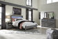 Baystorm Queen Panel Bed with Mirrored Dresser and Nightstand