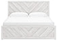 Cayboni King Panel Bed with Mirrored Dresser and Nightstand