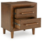 Lyncott King Upholstered Bed, Dresser, Mirror, Chest and Nightstand