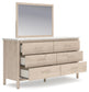 Cadmori Queen Upholstered Panel Bed with Mirrored Dresser