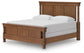 Chadworth California King Poster Bed with Mirrored Dresser