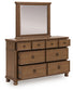 Chadworth Queen Poster Bed with Mirrored Dresser and Nightstand