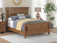 Chadworth Queen Poster Bed with Mirrored Dresser and Nightstand