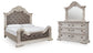Andonhall King Upholstered Panel Bed with Mirrored Dresser